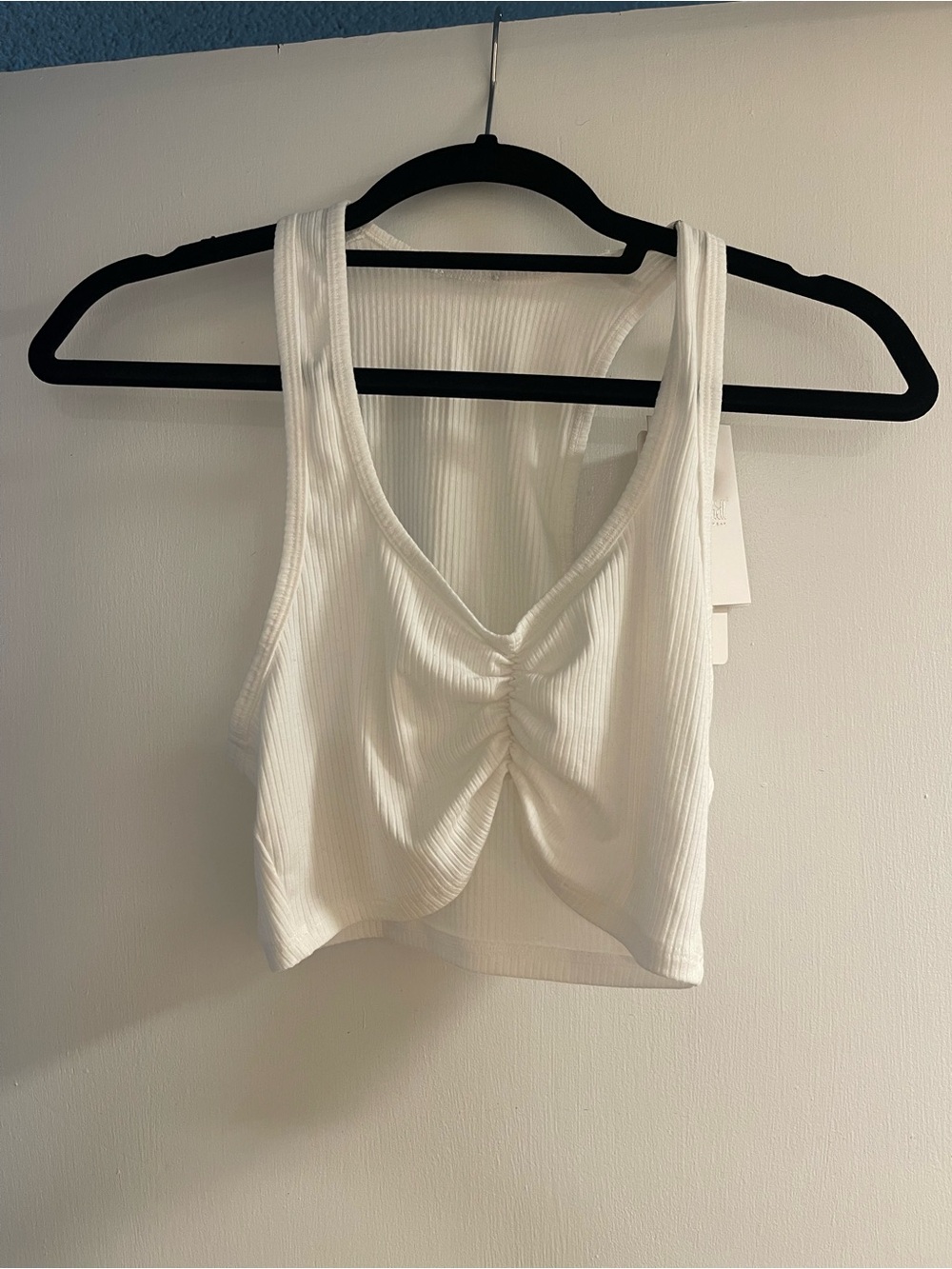 Bombshell Sportswear White Ribbed V-Neck Ruched Crop Tank